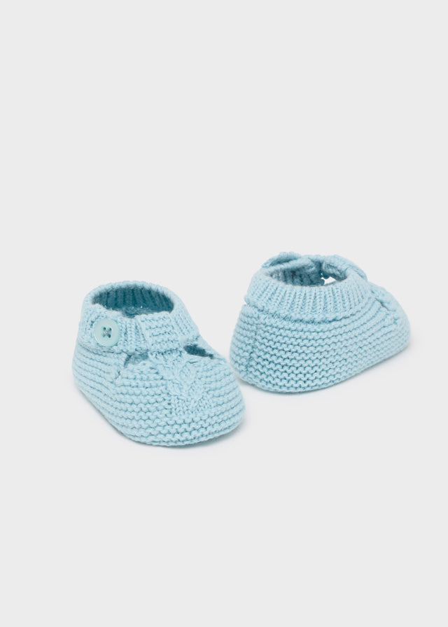 Knitting Booties in Glass Blue